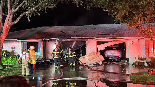 Vehicle fire in garage spreads to home in Oviedo