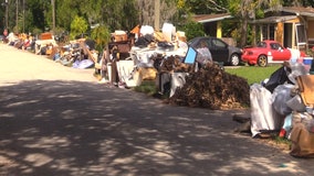 Massive amounts of storm debris fills Volusia County neighborhood, anxious residents await pick up