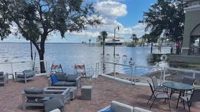 Rising St. Johns River now just feet away from Sanford businesses
