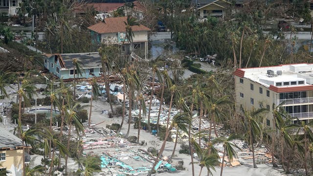 Ian evacuees return to mud, rubble as total storm-related deaths rise