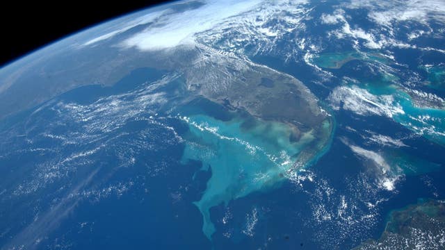 Shocking photos from space show Florida 'shedding' water from Hurricane Ian