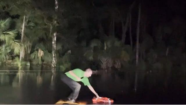 VIDEO: Florida driver saved after truck gets stuck underwater in Volusia County