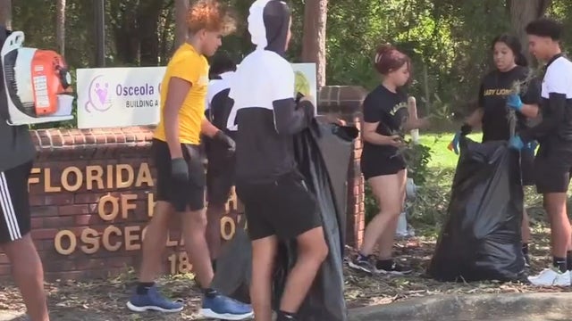 Kissimmee athletic academy students help clean up Osceola after Hurricane Ian