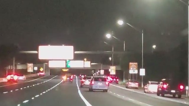 Orlando airport urges drivers to wait in cell lot while some choose to park on side of road