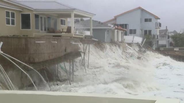 WATCH: Several homes in danger of collapsing into ocean due to beach erosion from Tropical Storm Nicole