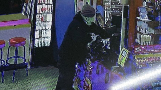 Investigators search for armed man accused of robbing Volusia County gas station