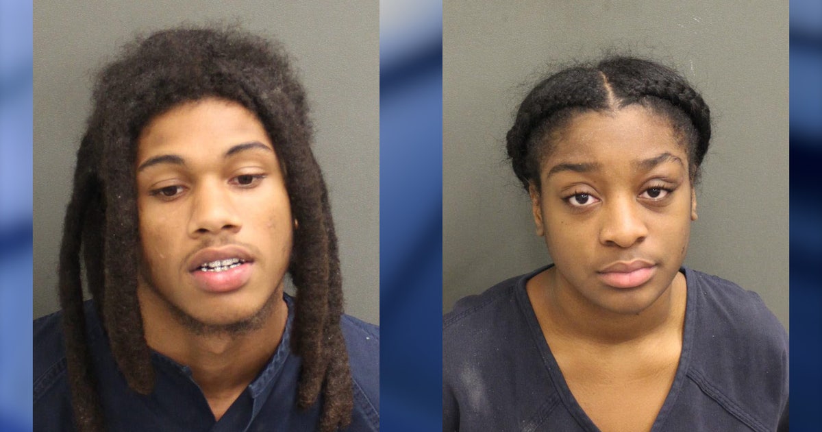 Two arrested after man was shot, killed in Orlando driveway of ...