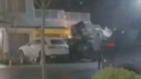 WATCH: Stolen car falls over embankment, lands on house in wild video