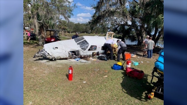 Plane carrying 2 people crashes onto Volusia County golf course