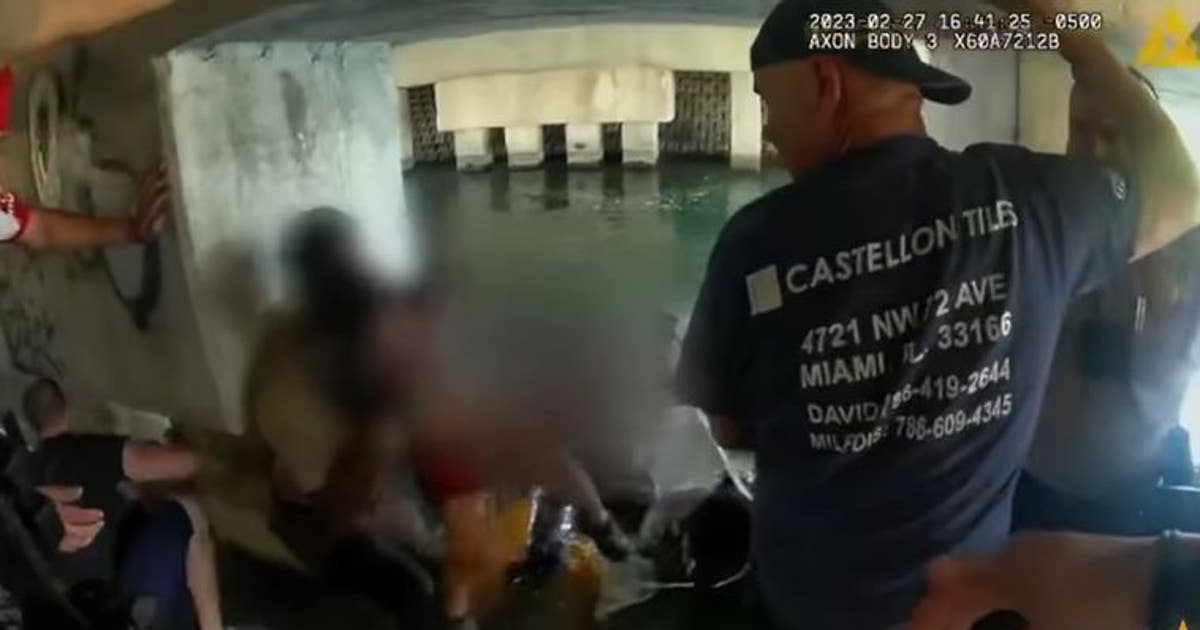 Body cam shows Miami police officers save 3-year-old after car drives ...