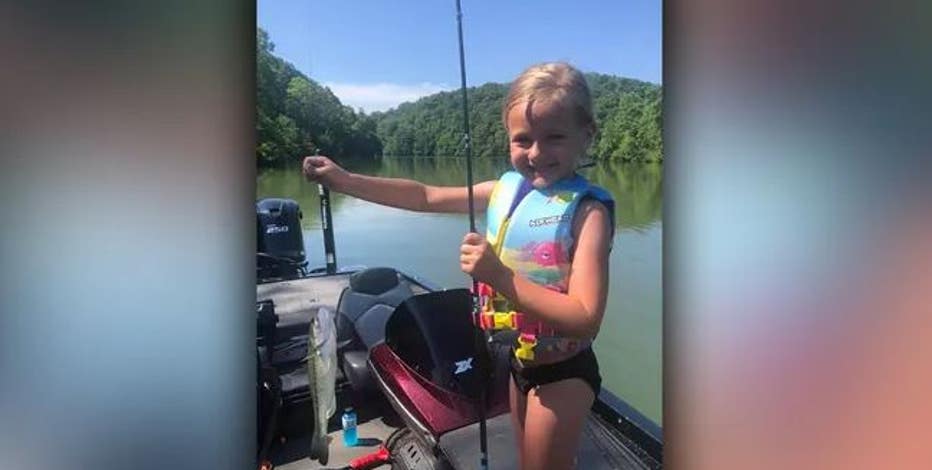 A Picture Of Girl Asking His Dad About Fishing For A Bit. She