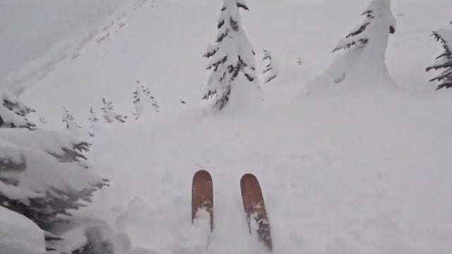 Washington state skier rescues snowboarder buried beneath snow in dramatic video