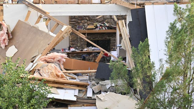 32 dead as tornadoes torment from Arkansas to Delaware
