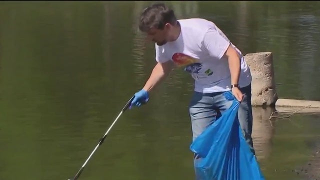 Volunteers gather to help clean the St. Johns River in Sanford
