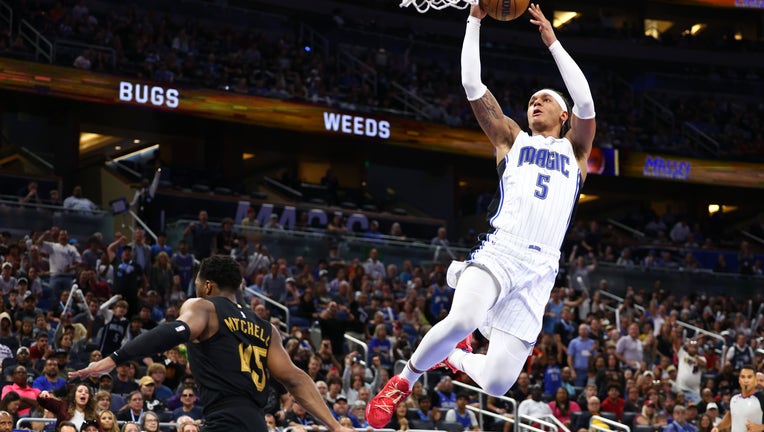Paolo Banchero of the Orlando Magic dunks the ball during the