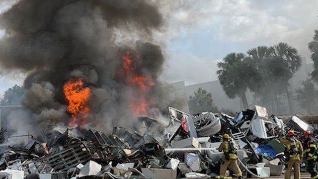 PHOTOS: Firefighters respond to fire outside recycling facility in Seminole County