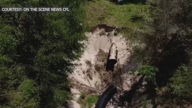 Florida residents see some progress on giant hole in backyard, still seek answers