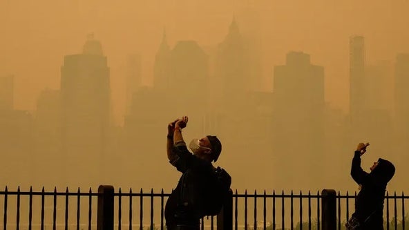 Dangerous air quality smothers major cities as Canada wildfires push smoke into US