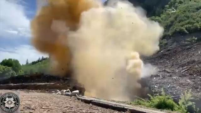 Wild video shows ice bridge explode over river