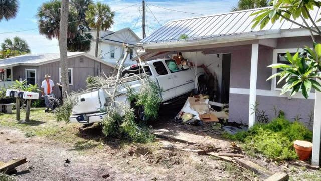 Truck driver pummels into Melbourne home during road rage incident, police say