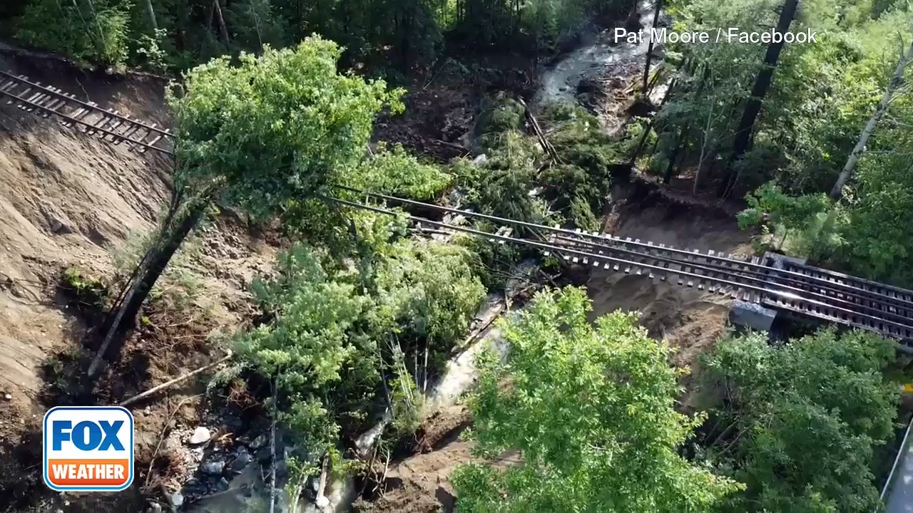 Aerial footage shows railroad tracks suspended in air after Vermont flooding wipes out trestle - Vimarsana News