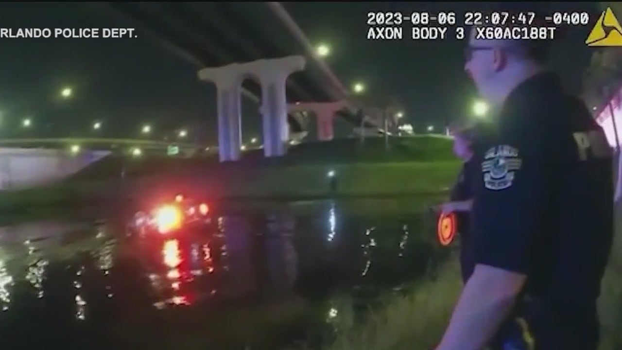 Orlando officers recount rescue of driver who crashed into pond near I ...