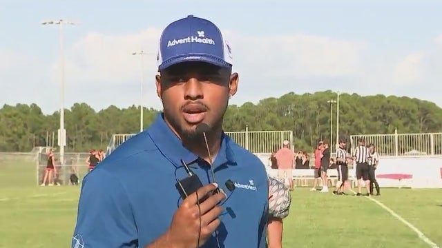 Athlete trades gridiron for tire iron, raises awareness about rare heart defect