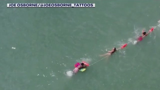 Drone video gives bird's-eye view of Flagler Beach lifeguards rescuing swimmer in Florida