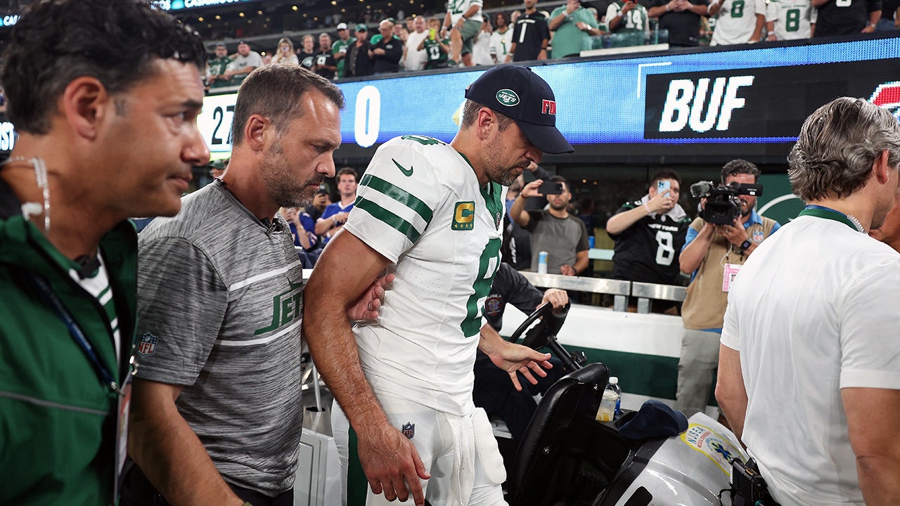 Aaron Rodgers hurts ankle in first series for Jets is carted off sideline and ruled out of game