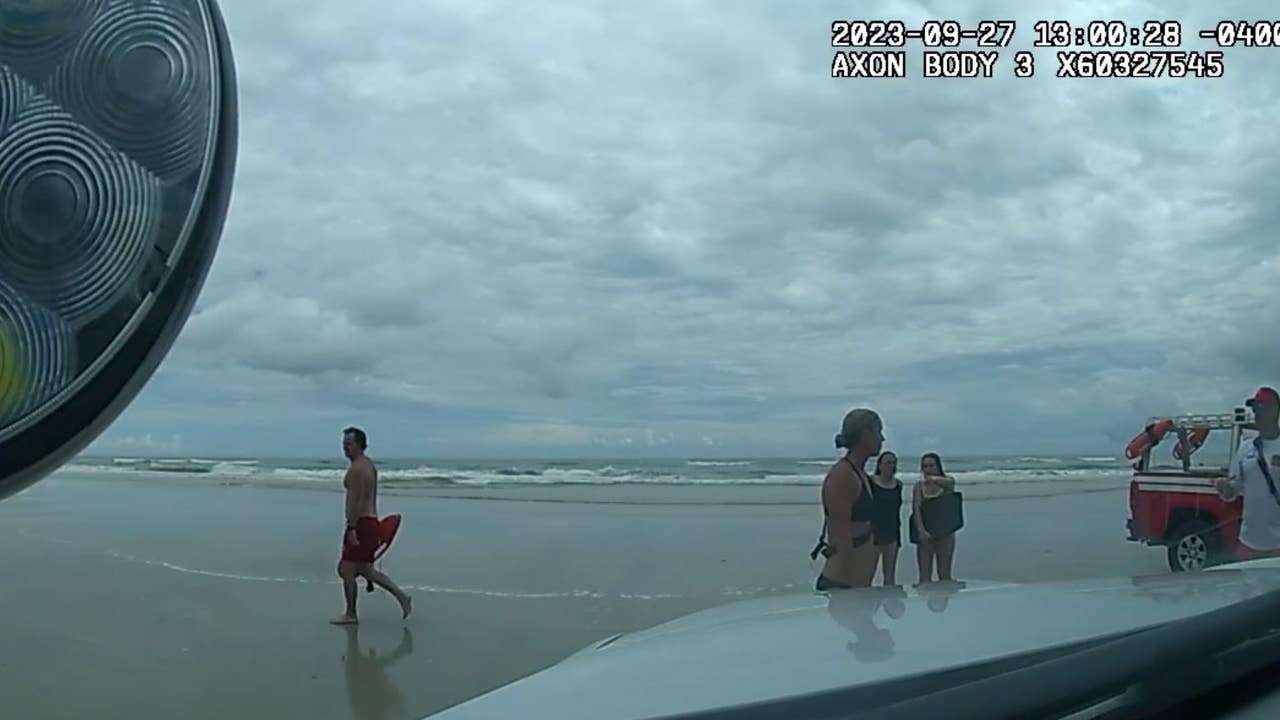 Florida deputy strips down to swimsuit to rescue boogie boarders struggling in the ocean