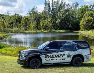 Pink Dodge Charger police car wrap in Orlando, October is B…