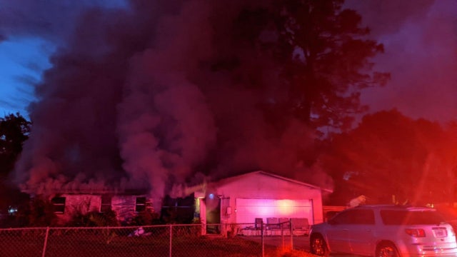 1 dead in massive house fire in Titusville, firefighters say