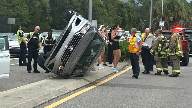 Car overturns in shocking crash on 30 mph road at UCF, police say