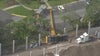 1 dead, 1 injured after crane topples at Orange County construction site: fire officials