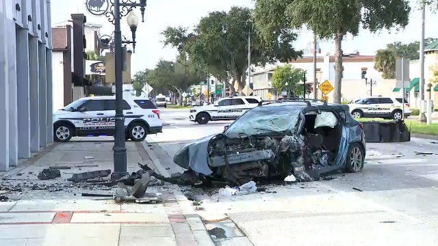 1 dead after car crashes into downtown Kissimmee building, police say
