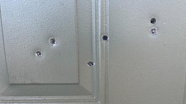 Bullets pass through apartment door leaving 2 injured in Ocala