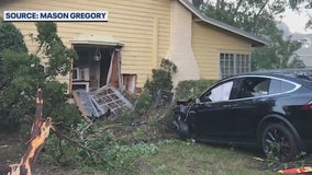 Tesla crashes into Winter Park home, driver cited: 'Could've killed us'