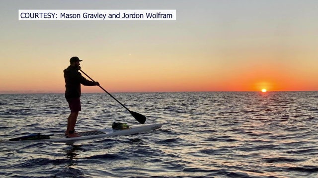 Florida men paddleboard across alligator-infested lake to raise awareness for conservation efforts