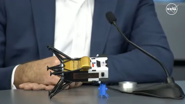 Odysseus lunar lander: Spacecraft on its side on moon's surface with some antennas covered