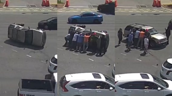 Good Samaritans help overturn SUV that flipped in crash at busy Daytona Beach intersection: WATCH