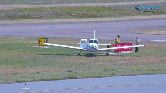 Small plane slides off runway at Orlando Sanford International Airport
