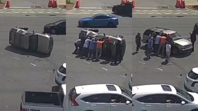 Good Samaritans help overturn SUV that flipped in crash at busy Daytona Beach intersection: WATCH