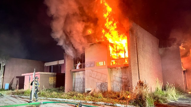 Massive fire engulfs abandoned motel near Universal's Endless Summer Resort
