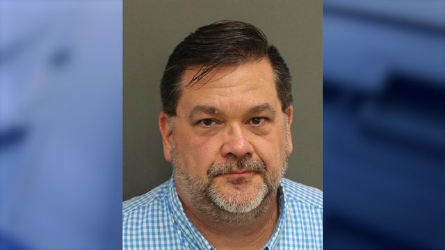 Florida teacher accused of exposing self through Disney hotel window to pool guests