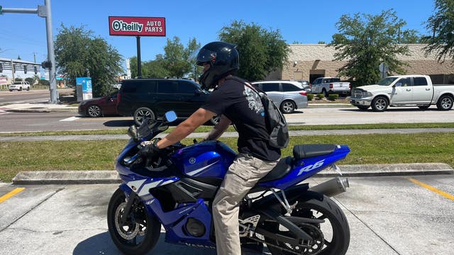Mystery motorcyclist identified after pushing man in wheelchair across Merritt Island street