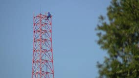 Man arrested for climbing communications tower in Winter Park, police say