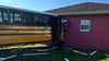 Marion County school bus crashes into house after truck runs stop sign: FHP