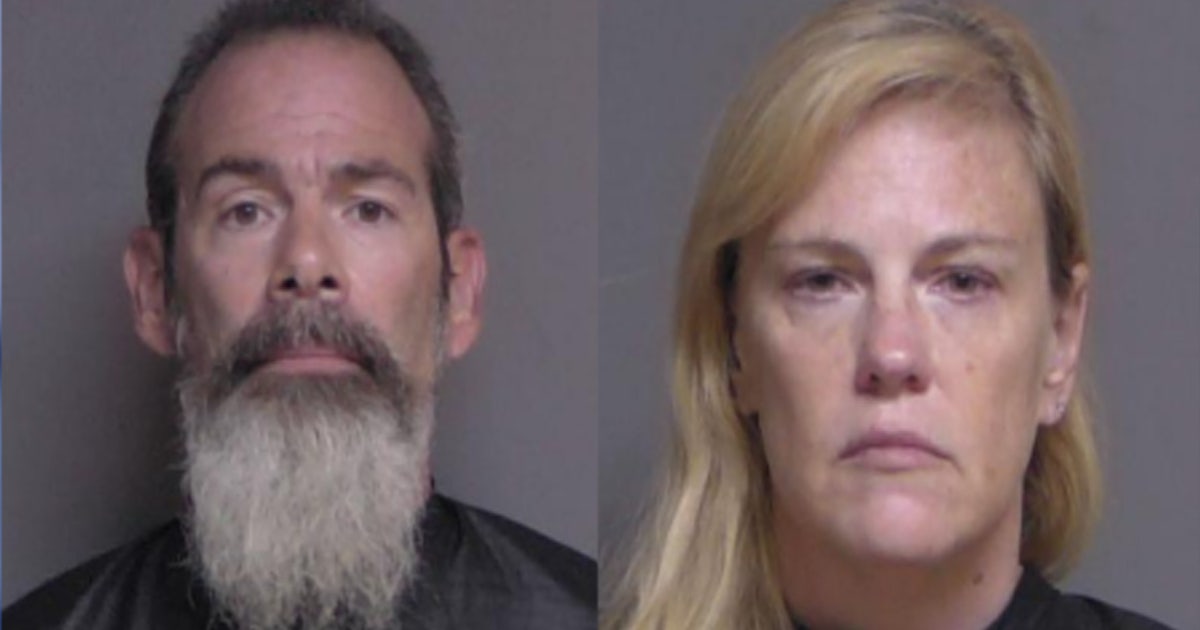 Palm Coast couple accused of smashing car window, pointing gun at ...