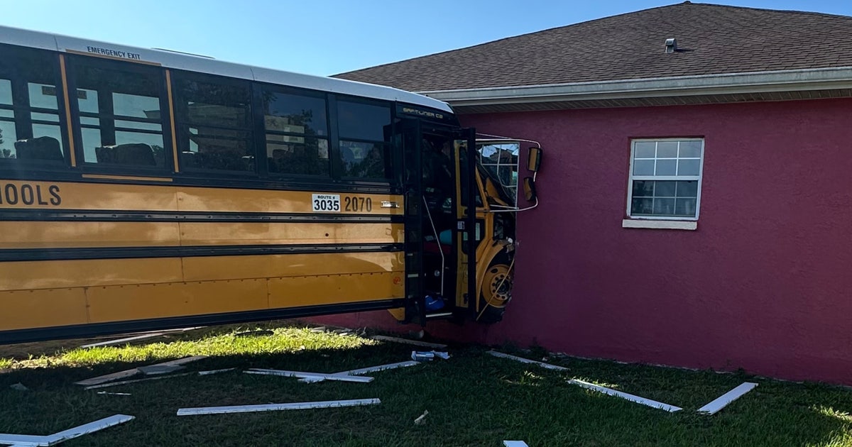 Marion County school bus crashes into house after truck runs stop sign ...