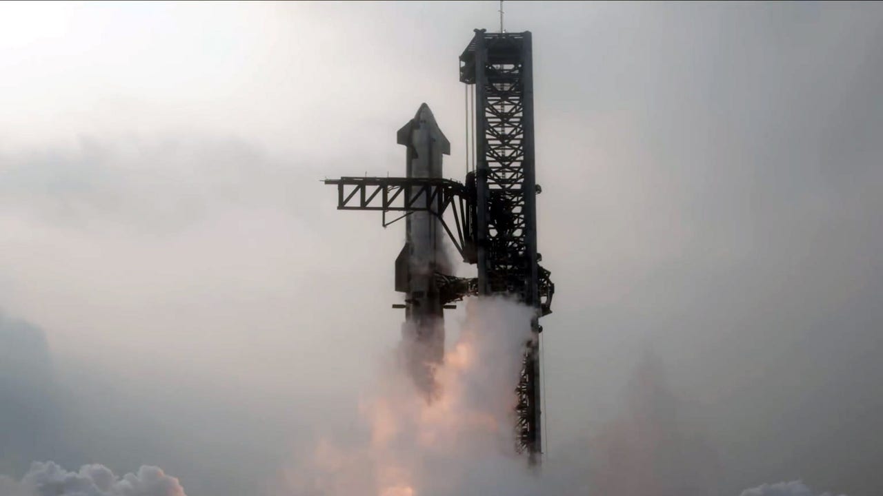 SpaceX catches rocket booster in historic Starship test flight